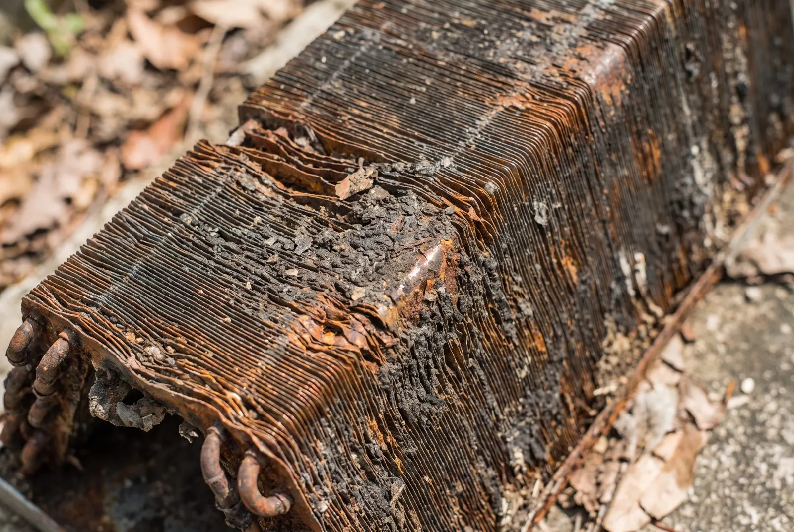 Close-up of a badly corroded AC condenser coil